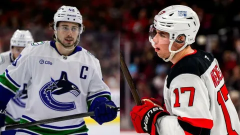 Quinn Hughes a Šimon Nemec