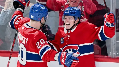 Juraj Slafkovský a Cole Caufield